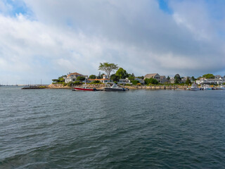 Fototapeta premium Historic waterfront houses at Lewis Bay in village of Hyannis, town of Barnstable, Cape Cod, Massachusetts MA, USA. 