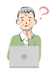 パソコン操作で悩むシニア男性