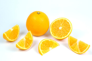Fototapeta na wymiar An orange with sliced oranges white background