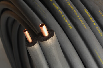detail  of insulated copper pipe coiled and ready for installation.