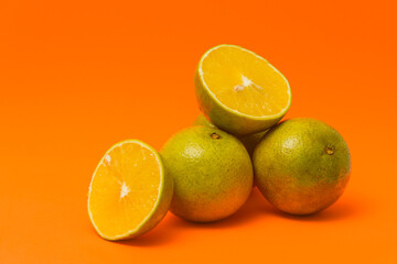 orange and lime in orange bacground isolated