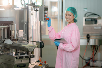 Asian professional food scientist checking and control quality of beverage