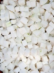 Preparing cubed radish Kimchi Kkakdugi - Korean food