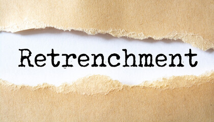 Retrenchment word written under torn paper.