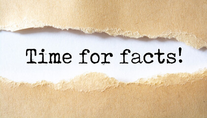 Time for facts message written under torn paper