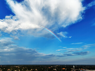 Rainbow Running Through a Blue Sky