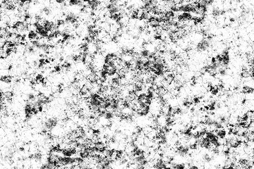 Scattered dark grunge wall texture with cracks