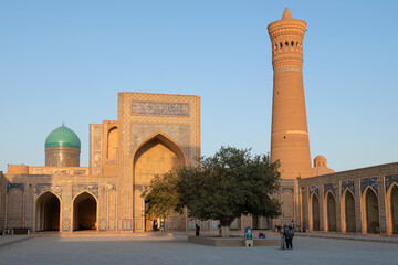 Sunny evening on the territory of the ancient Po-i-Kalyan madrasah, Bukhara. Uzbekistan