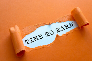 TIME TO EARN message written under torn paper.