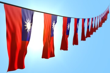 cute national holiday flag 3d illustration. - many Taiwan Province of China flags or banners hangs diagonal on string on blue sky background with soft focus
