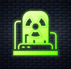 Glowing neon Radioactive warning lamp icon isolated on brick wall background. Vector