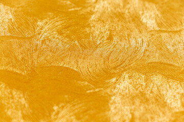 金色の紙の表面の精細な曲線模様