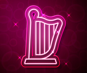 Glowing neon line Harp icon isolated on red background. Classical music instrument, orhestra string acoustic element. Vector