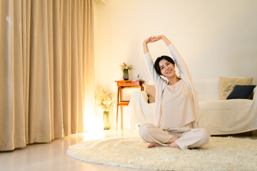 Woman stretching before going to bed