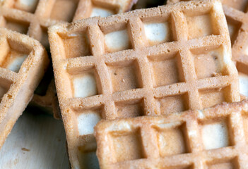 square sweet soft waffles on the table