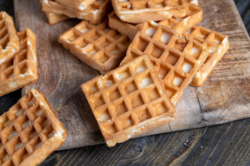 soft sweet waffles on the table, close up