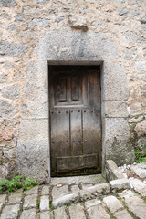Fototapeta na wymiar very old wooden front door