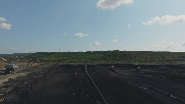 Open pit mine, extractive industry for coal, top view aerial drone