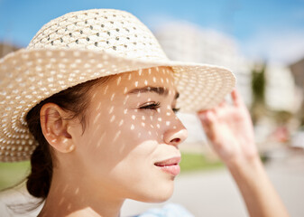 Summer, travel and beach sun hat by woman looking content, relax and calm, enjoying fresh air and...