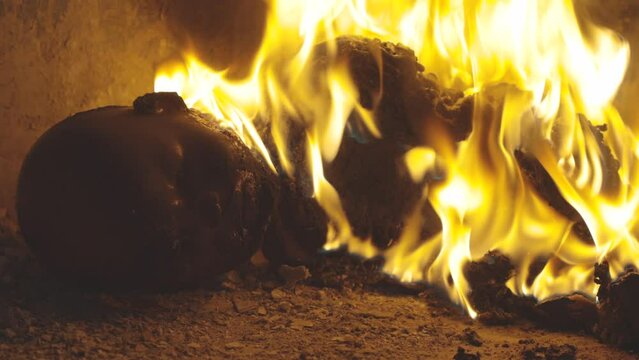 plastic doll on fire. burnt man silhouette