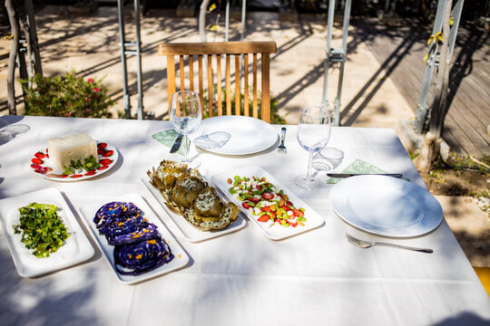 Luxury vegetarian Mediterranean style dining experience on a white table cloth