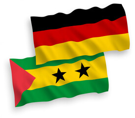 National vector fabric wave flags of Germany and Saint Thomas and Prince isolated on white background. 1 to 2 proportion.