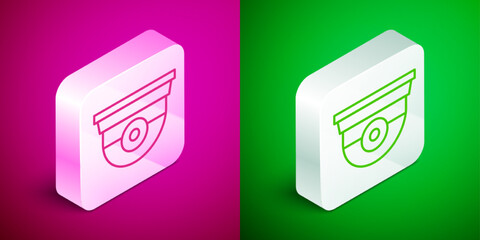 Isometric line Security camera icon isolated on pink and green background. Silver square button. Vector