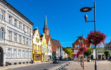 Panorama of Rynek main market square with Holy Mary gothic church in old town quarter of Trzebiatow in Poland © Art Media Factory