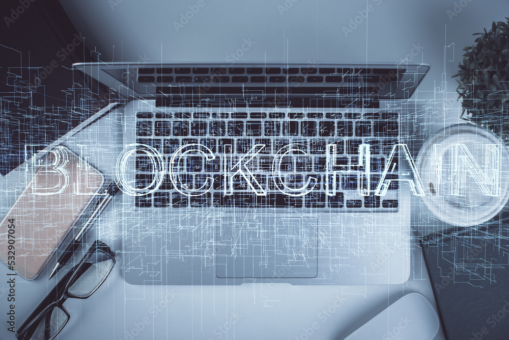 Poster blockchain theme hologram drawings over computer on the desktop background. top view. double exposur