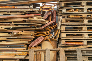 Used wood to be recycled in the landfill.