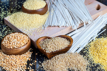 Fresh uncooked bulgur porridge on the table