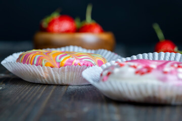 round donuts in glaze and with berry filling