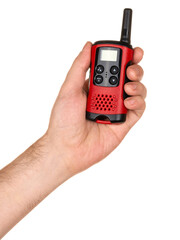 Man's hand holding handheld radio communication device walkie-talkie with display in red color. Isolated on white background.