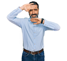 Middle aged man with beard wearing business shirt smiling cheerful playing peek a boo with hands showing face. surprised and exited