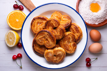 Palmeritas. Puff pastry palm trees with sugar. Spanish traditional dessert.