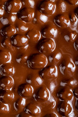 real milk chocolate while cooking with hazelnuts