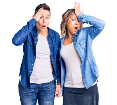Couple of women wearing casual clothes surprised with hand on head for mistake, remember error. forgot, bad memory concept.