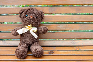 Teddy bear outdoors in the park.