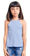Young little girl with bang wearing casual clothes with serious expression on face. simple and...