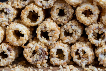 waffle tube with chocolate filling and crushed peanuts