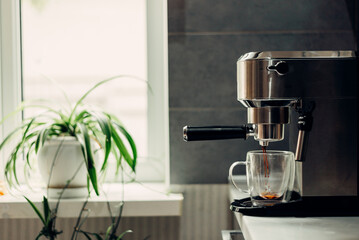 fresh aromatic coffee at home using a modern coffee maker