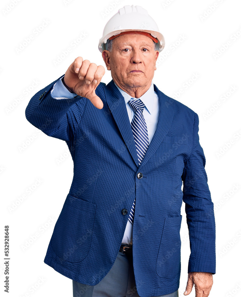 Poster senior handsome grey-haired man wearing suit and architect hardhat looking unhappy and angry showing