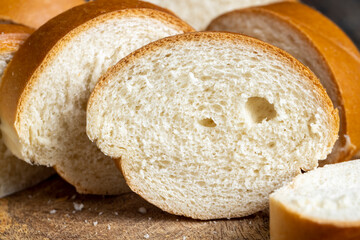 Sliced wheat loaf on the table