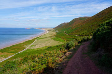 Fototapeta na wymiar Across Rhossili Bay on the Gower Peninsula along a winding footpath