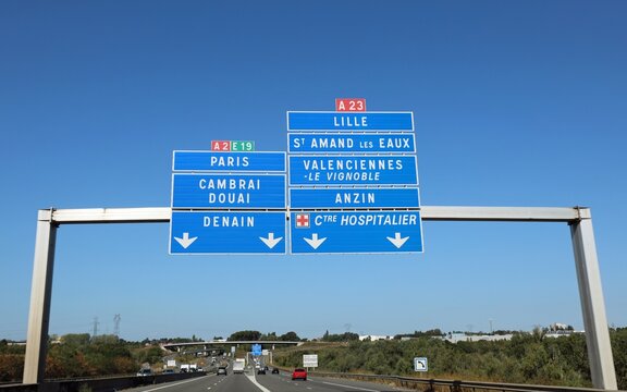 road sign with directions to go to French places