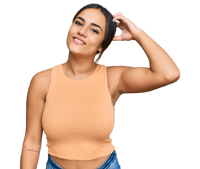 Young brunette woman wearing casual clothes confuse and wonder about question. uncertain with doubt, thinking with hand on head. pensive concept.