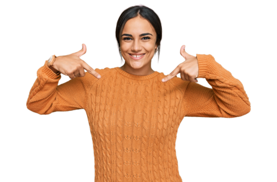 Young brunette woman wearing casual winter sweater looking confident with smile on face, pointing oneself with fingers proud and happy.