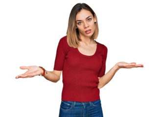 Young blonde girl wearing casual clothes clueless and confused with open arms, no idea concept.