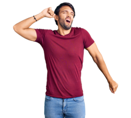 Handsome hispanic man wearing casual clothes stretching back, tired and relaxed, sleepy and yawning for early morning