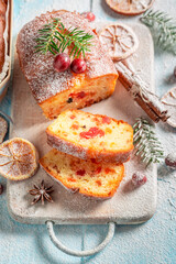 Sweet and homemade Fruitcake for Christmas ornamented